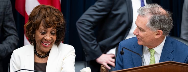 Rep. Maxine Waters, D-Calif., and chairman Rep. French Hill, R-Ark., talk before the start of the House Financial Services Committee hearing in 2025.