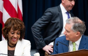 Rep. Maxine Waters, D-Calif., and chairman Rep. French Hill, R-Ark., talk before the start of the House Financial Services Committee hearing in 2025.