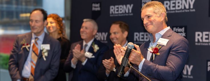 Geoffrey Newman of Savills accepts the Henry Hart Rice Achievement Award at REBNY’s Annual Commercial Sales Most Ingenious Deal of the Year Awards.