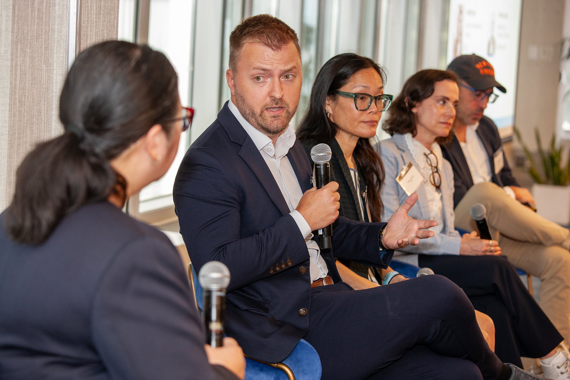 Noah Hale (second from left) speaks on a panel with Sheila Pozon (from left), Jennifer Sun, Miriam Harris and John Valladares.