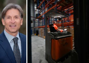 Arden Logistic Parks's Craig Spencer and an employee working inside a warehouse.