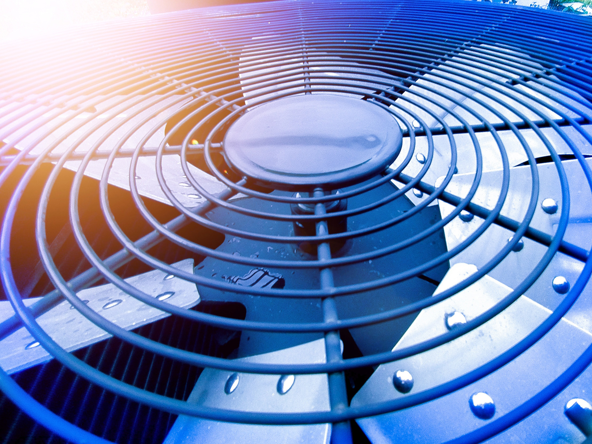A close-up of a metal ventilation fan.