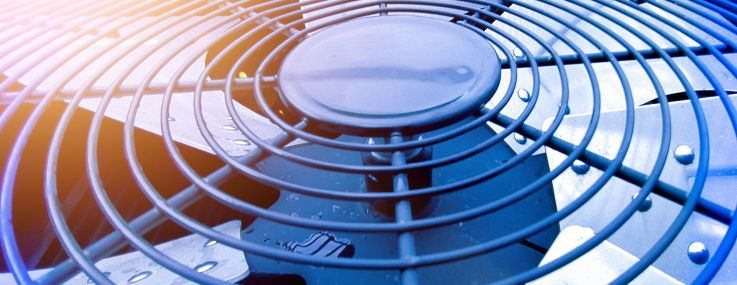 A close-up of a metal ventilation fan.