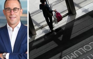 Related Companies's Jeff Blau and a shopper carrying bags at the Shops at Columbus Circle.