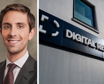 Blackstone's Mike Forman and a Digital Realty sign outside one of its data centers.