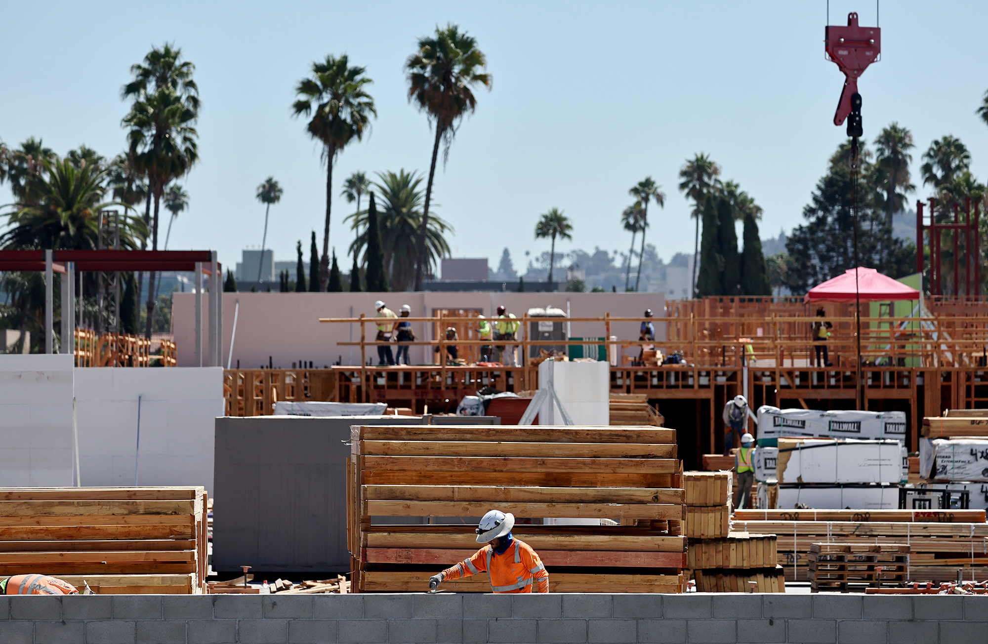 Construction continues on a mixed-use apartment complex in Los Angeles in 2024.