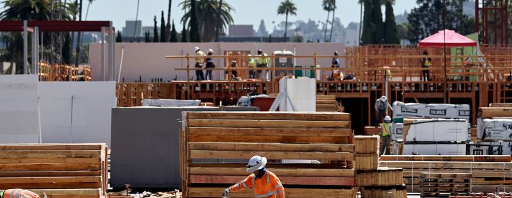 Construction continues on a mixed-use apartment complex in Los Angeles in 2024.