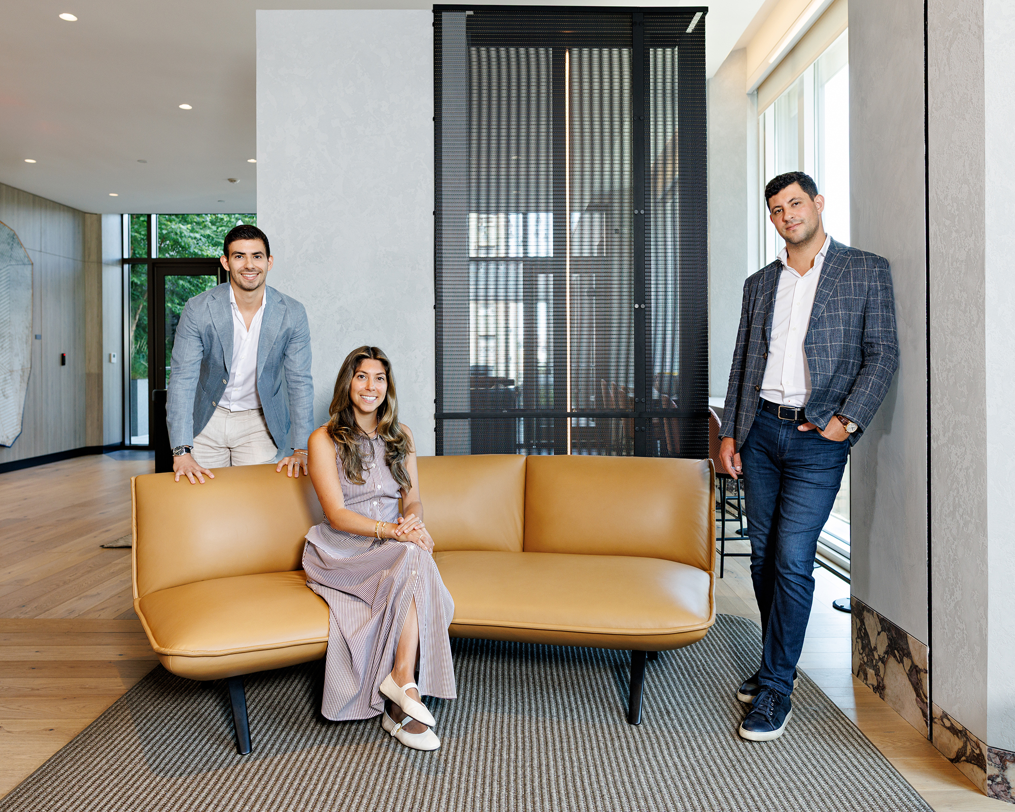 Ben (from left), Nicole and Matthew Picket of Gotham Organization at 55 Suffolk Street, one of the company's residential projects.