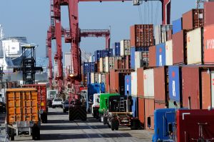 Semi truck drivers arrive to pickup and deliver products at the Port of Long Beach.