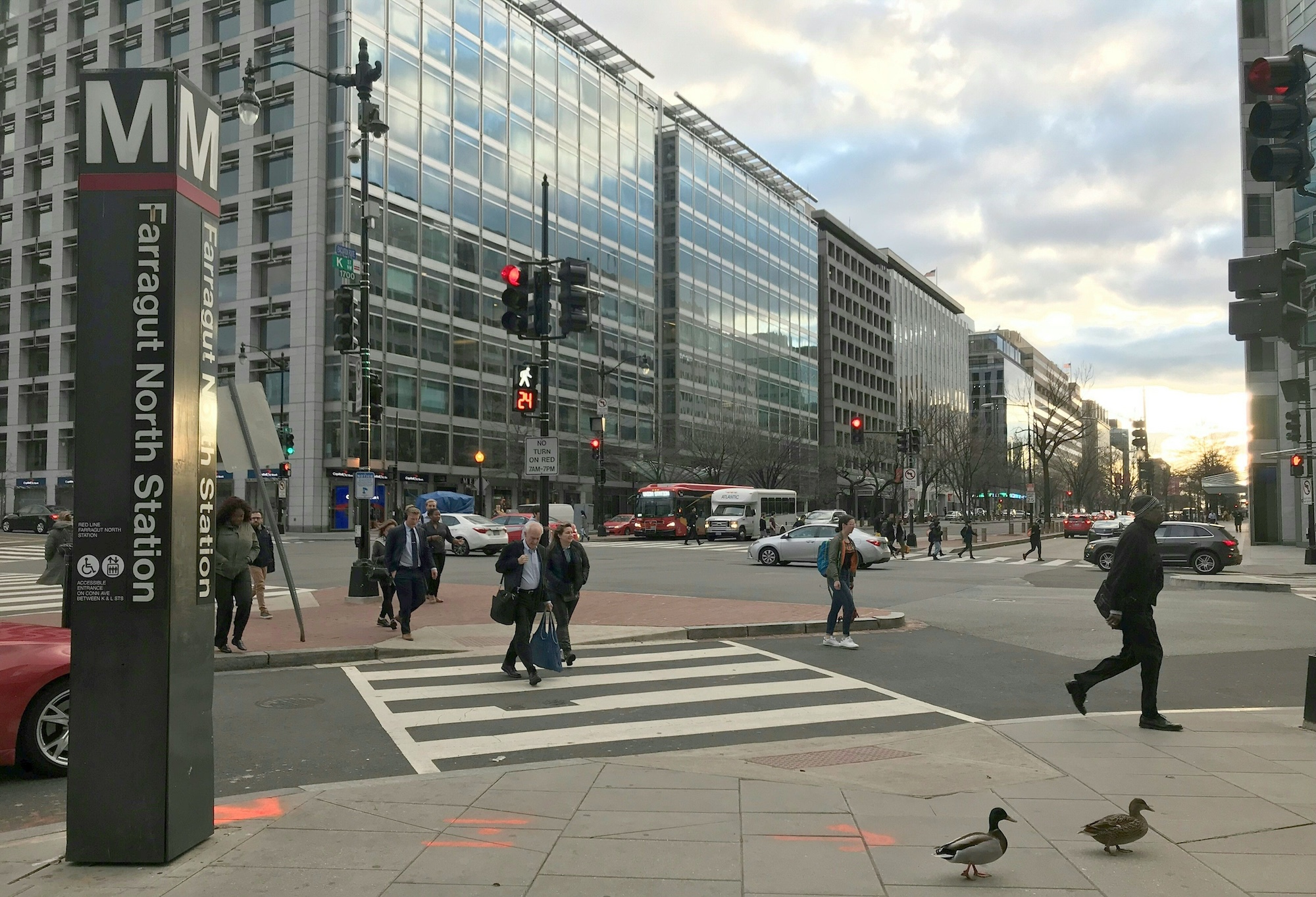 Pedestrians cross the Street downtown Washington, D.C.