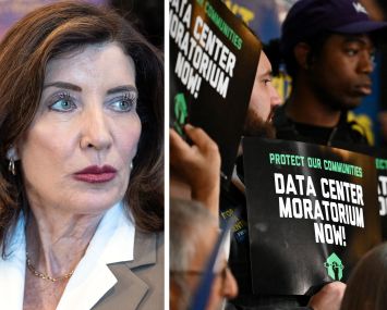 Gov. Kathy Hochul and advocates for a data center moratorium hold signs at a rally in Albany, N.Y., in May.