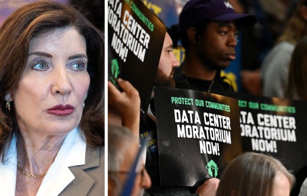 Gov. Kathy Hochul and advocates for a data center moratorium hold signs at a rally in Albany, N.Y., in May.