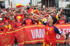 Team Spain fans march on their way to SoFi Stadium before a World Cup round of 32 match against Austria.