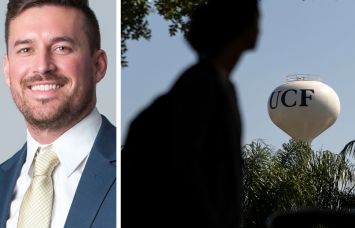 Affinius Capital's Tyler Figley and a student walks past a water tower at the University of Central Florida.