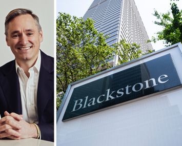 Blackstone Mortgage Trust Chairman and CEO Tim Johnson and a Blackstone sign outside one of the company's offices.