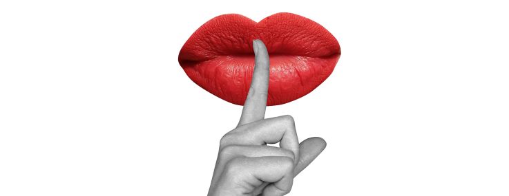 An illustration of an index finger of a hand pressed to a pair of lips signifying silence.