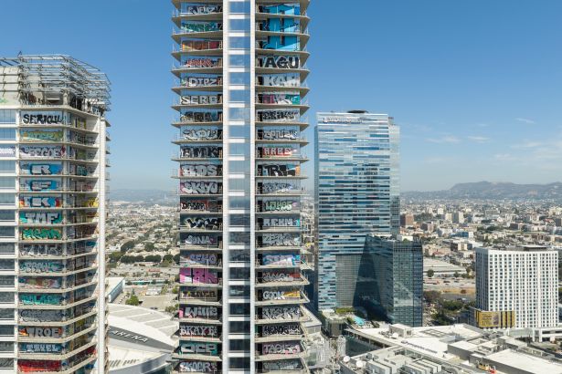 Graffiti-covered Oceanwide Plaza development (center and left) in Downtown Los Angeles.