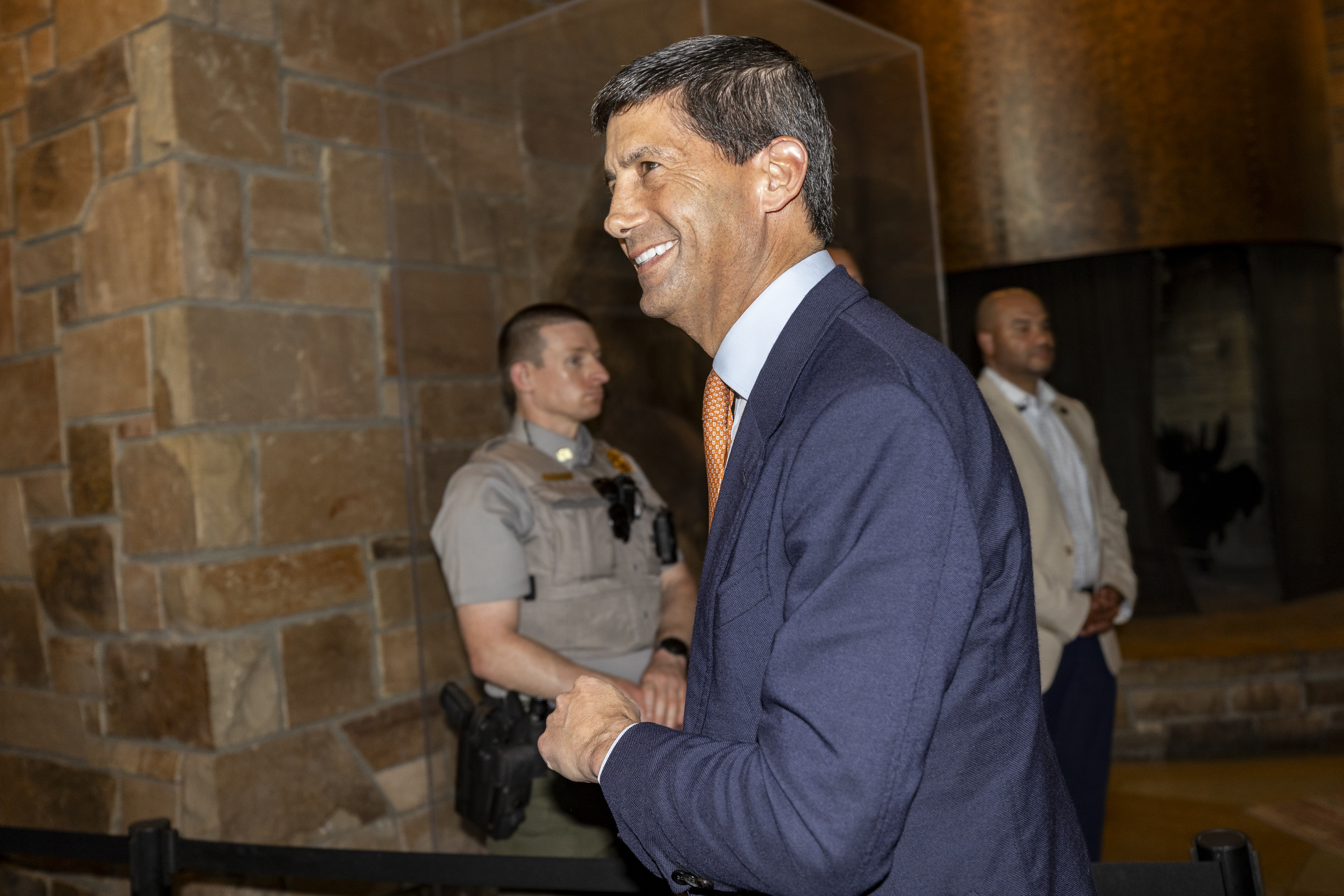 Federal Reserve Chairman Kevin Warsh (center) arrives at the Jackson Hole Economic Symposium August 27, 2026 in Jackson Hole, Wyoming.