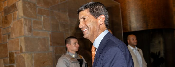 Federal Reserve Chairman Kevin Warsh (center) arrives at the Jackson Hole Economic Symposium August 27, 2026 in Jackson Hole, Wyoming.