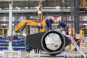 Employees working at an advanced manufacturing plant.