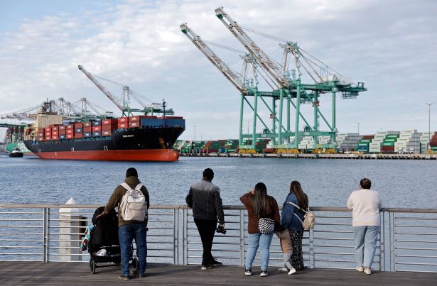 Shifting Fortunes for L.A.s Ports Boost Surrounding Industrial Real Estate People watch as a container ship departs from the Port of Los Angeles.