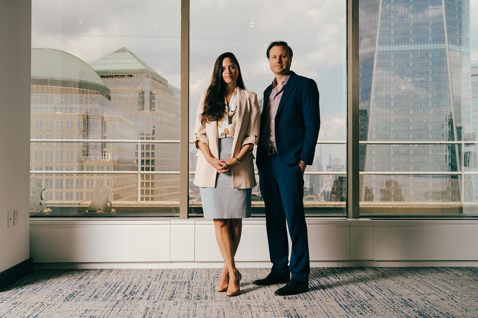 Sulie Arias (left) and Trevor Adler of Hogan Lovells Cadwalader.