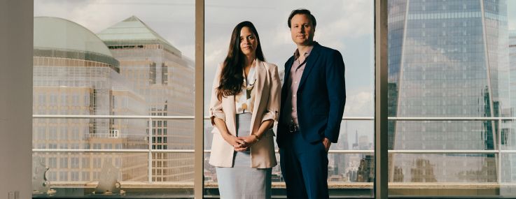 Sulie Arias (left) and Trevor Adler of Hogan Lovells Cadwalader.