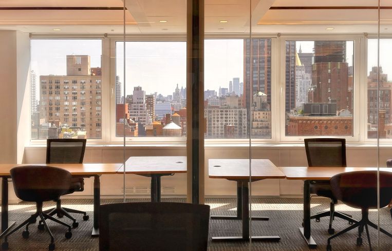 Amenities include a conference room with seating for more than 20 people.