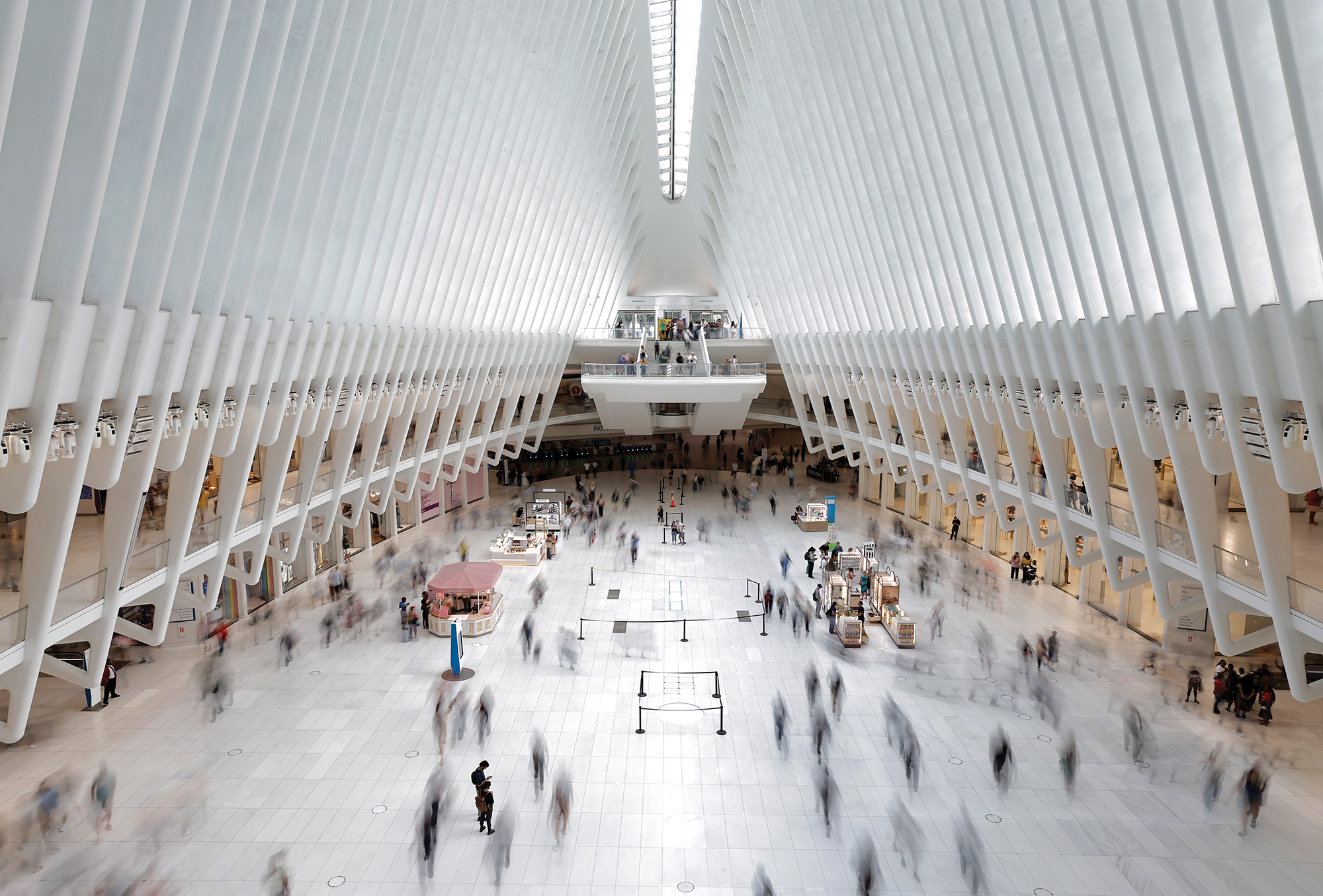 People pass through in Santiago Calatrava’s Oculus World Trade Center transit hub.