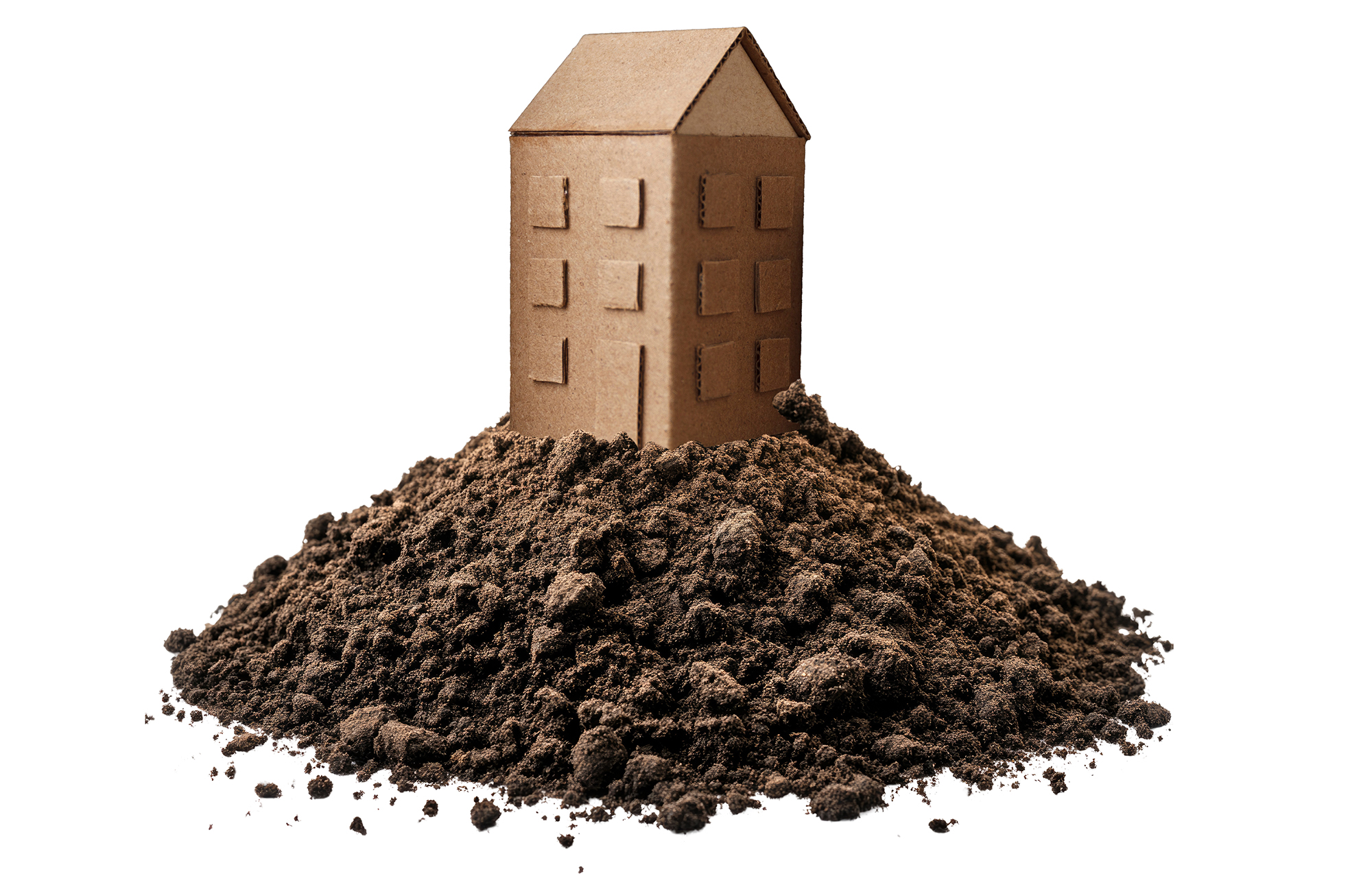 An illustration of a cardboard building on a pile of dirt.