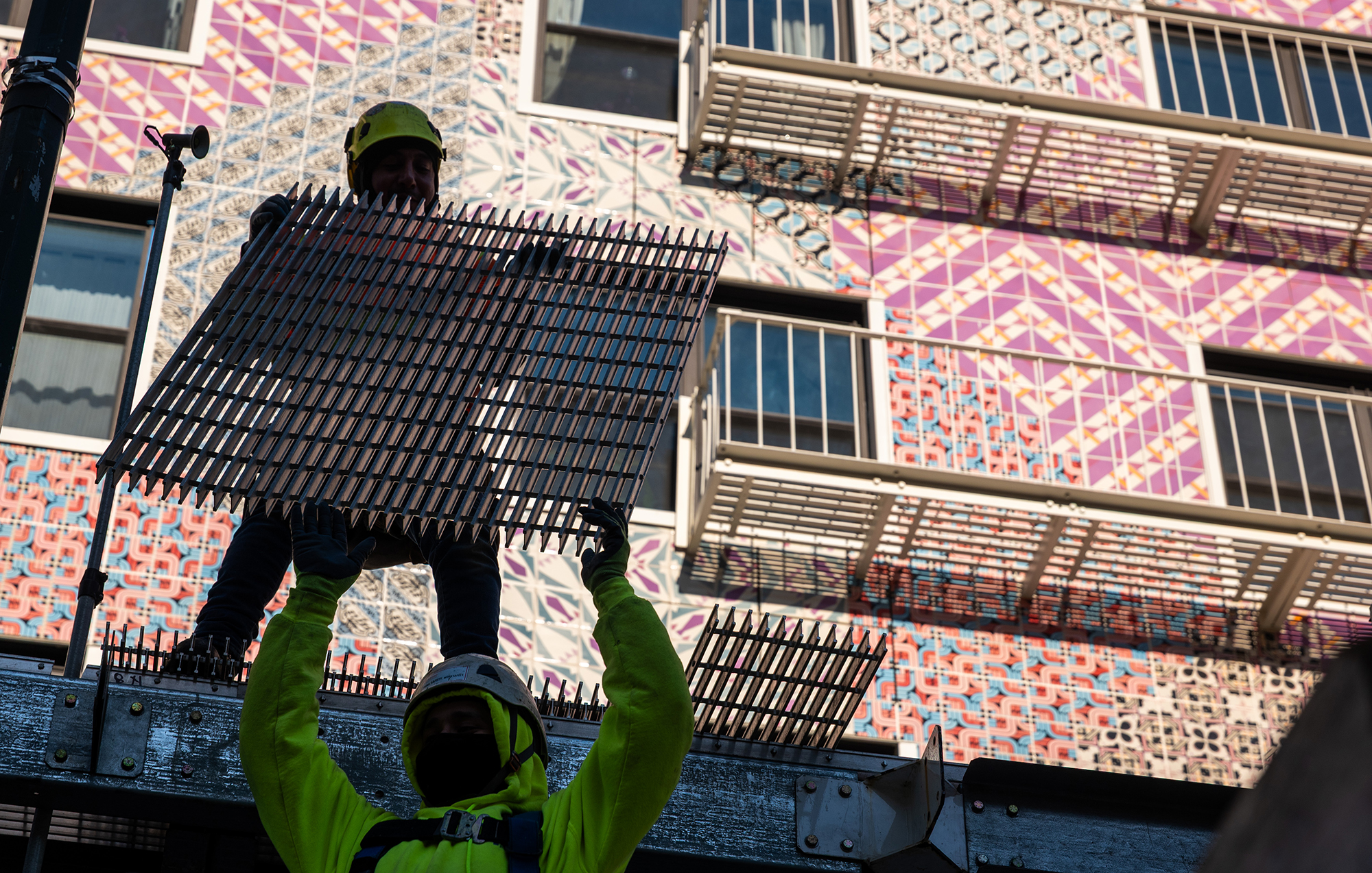 Men work on a construction site in Manhattan.
