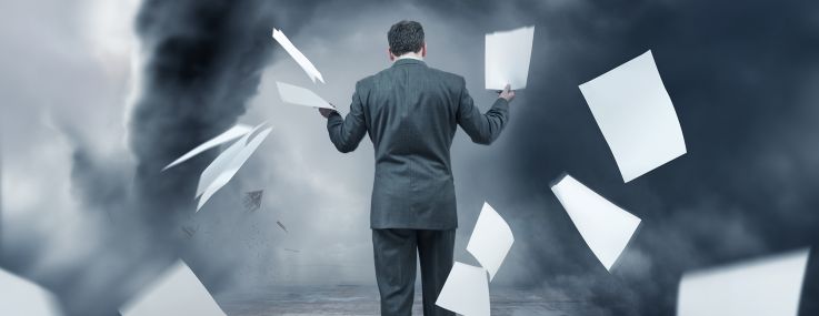 An illustration of a businessman tossing sheets of paper as he walks down a foggy road.