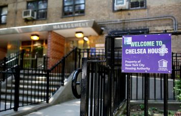A NYCHA sign is displayed outside the Chelsea Houses in Manhattan.