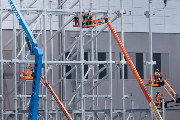 Welcome to Data Centerville, U.S.A.: How One Asset Class Changed Loudoun County, Va. Construction workers build a new data center in Stone Ridge, Va.