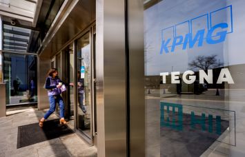 A person walks into an office building in Mclean, Virginia.