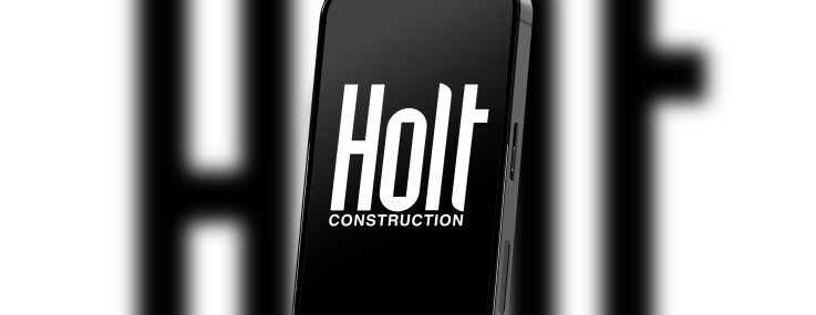 Holt Construction logo displayed on a mobile phone.