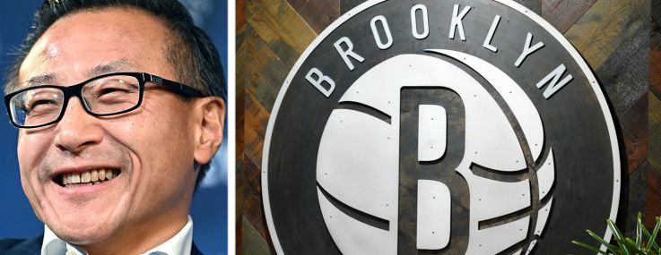 Brooklyn Nets owner Joseph Tsai and the team's logo inside the Brooklyn Nets HSS Training Center in Industry City, Brooklyn.
