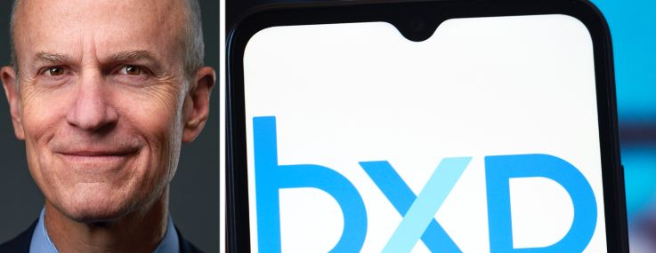 BXP CEO Owen Thomas and the BXP logo displayed on a mobile phone screen.