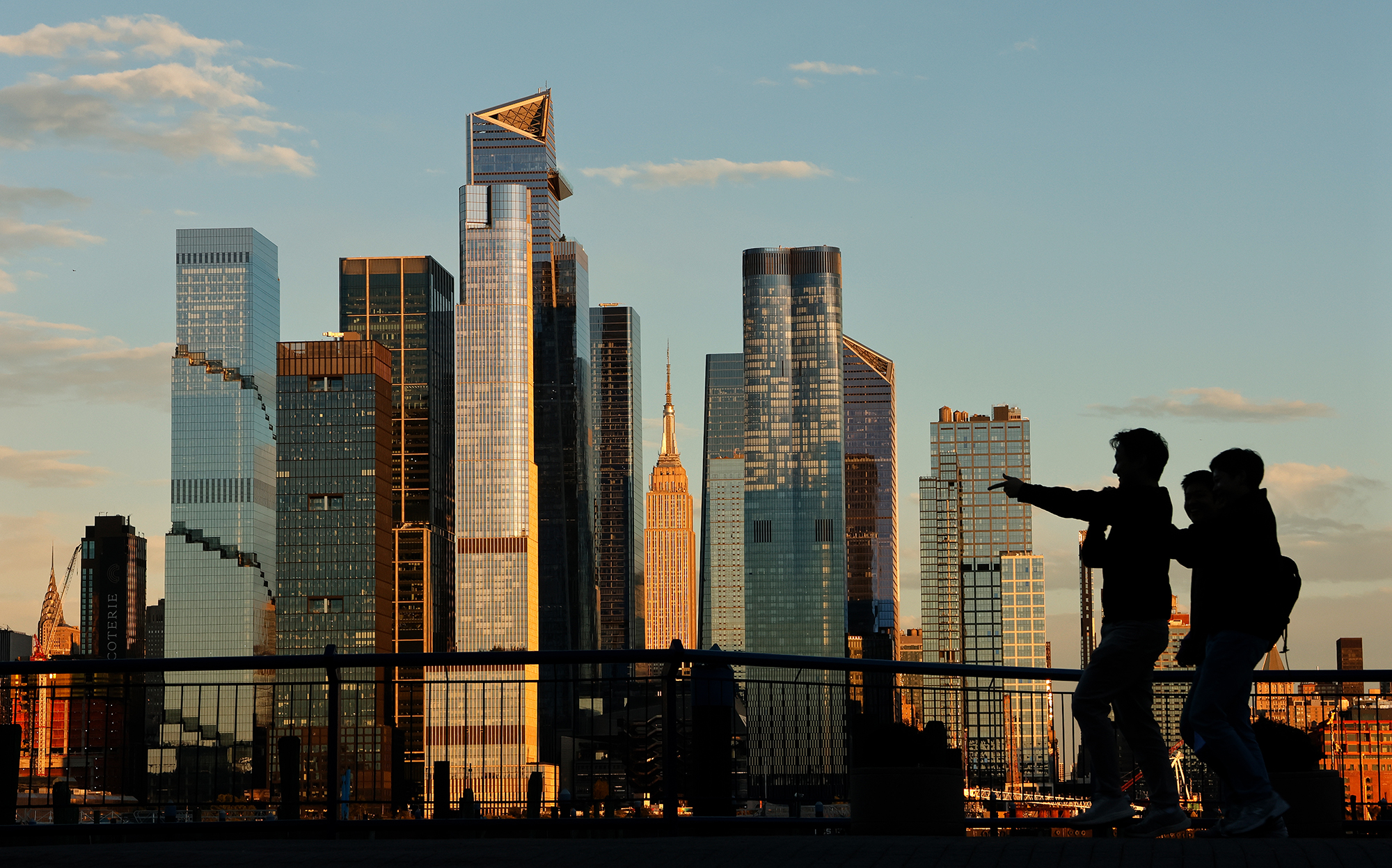 The sun sets on the skyline of midtown Manhattan.